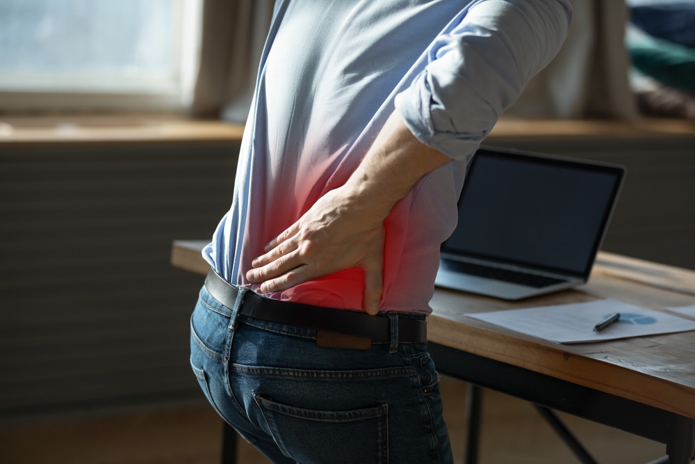 Low back pain at non-ergonomic lab table