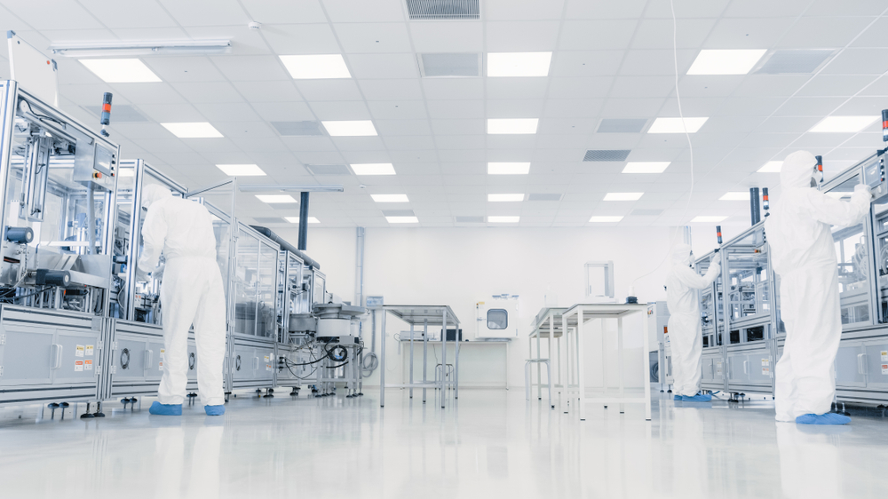 Research scientists in clean room laboratory