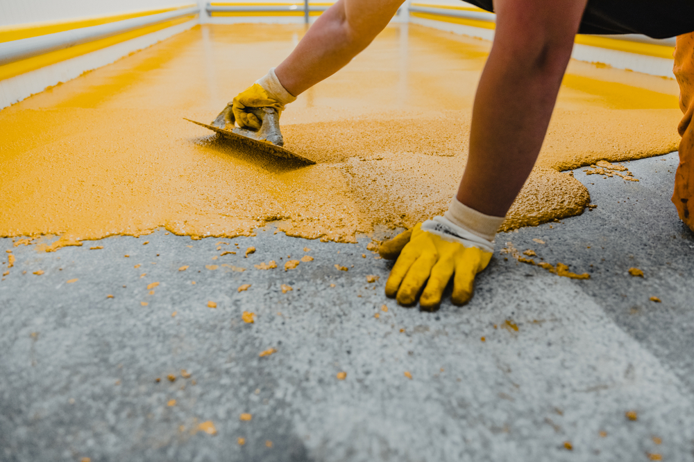 Epoxy laboratory flooring with slip resistant agent