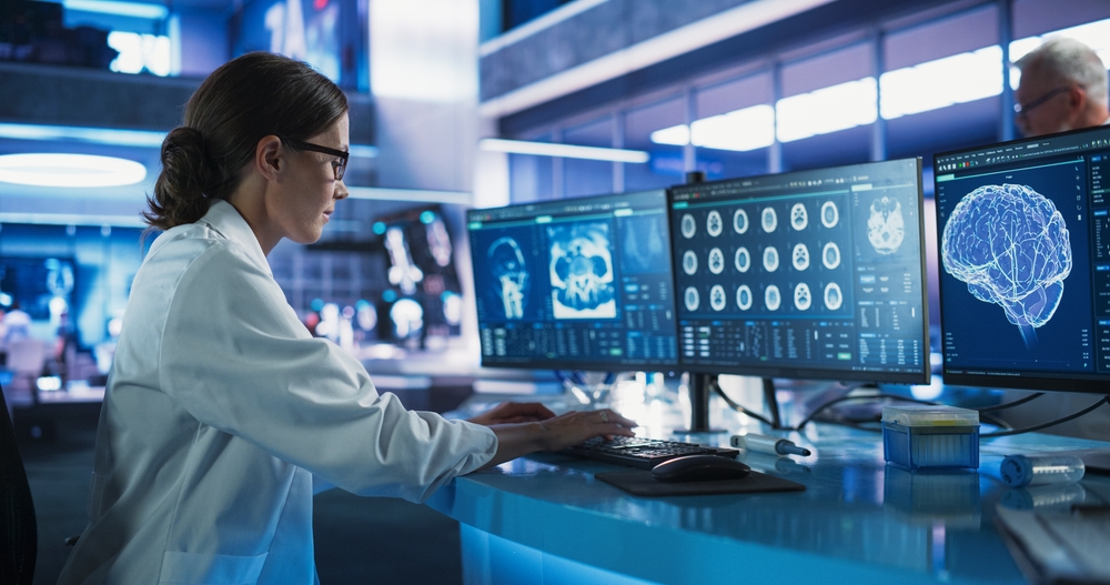 Neuroscientist Using Desktop Computer 