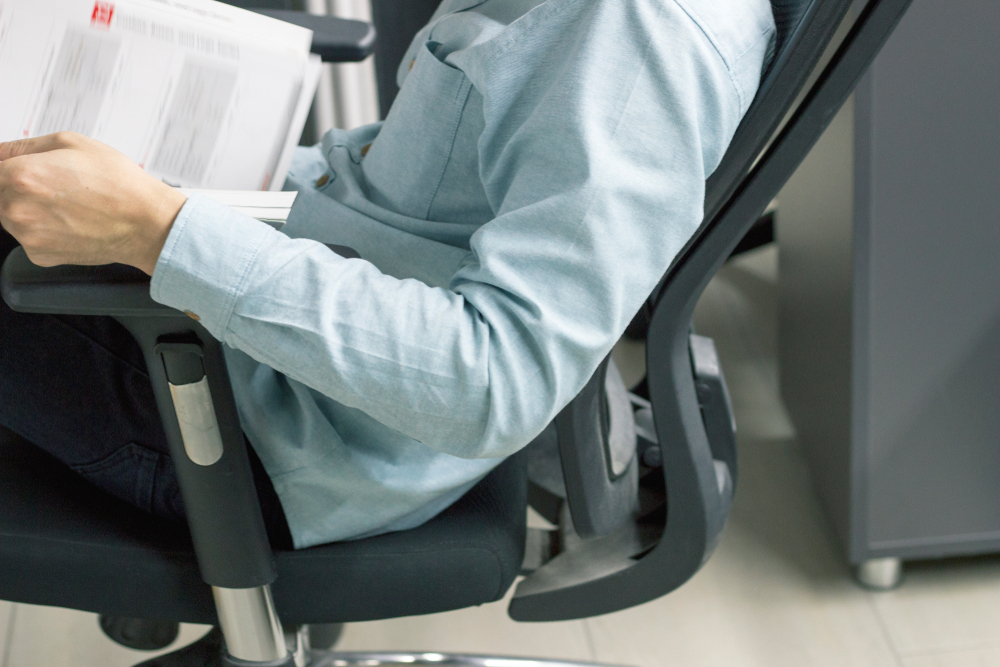 Laboratory seating -man working an ergonomic chair 