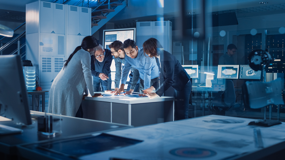 Scientists meeting in Technology Research Lab 